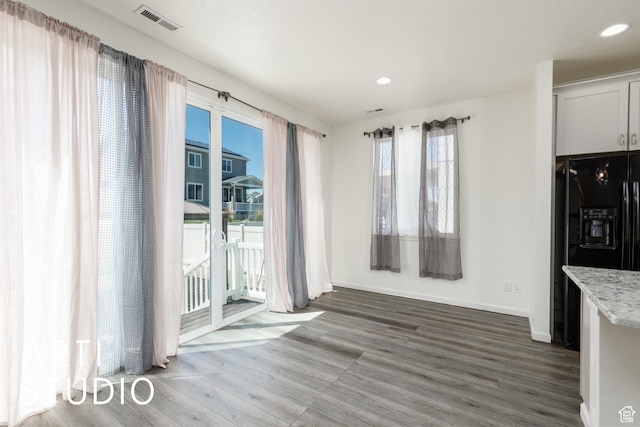 5241 S 1250 W, Riverdale, UT 84405 - unfurnished dining area featuring wood finished floors and recessed lighting