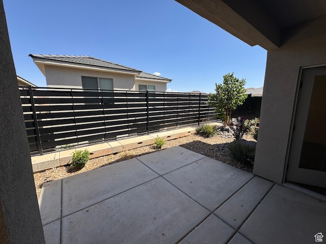 503 S Stewart Creek Cv, Washington, UT 84780 - fenced backyard featuring a patio area