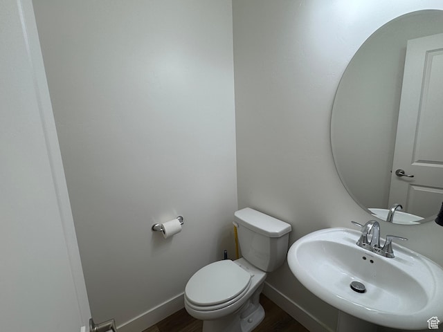 503 S Stewart Creek Cv, Washington, UT 84780 - half bath with a sink and wood finished floors