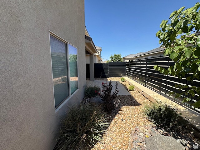 503 S Stewart Creek Cv, Washington, UT 84780 - fenced backyard featuring a patio area