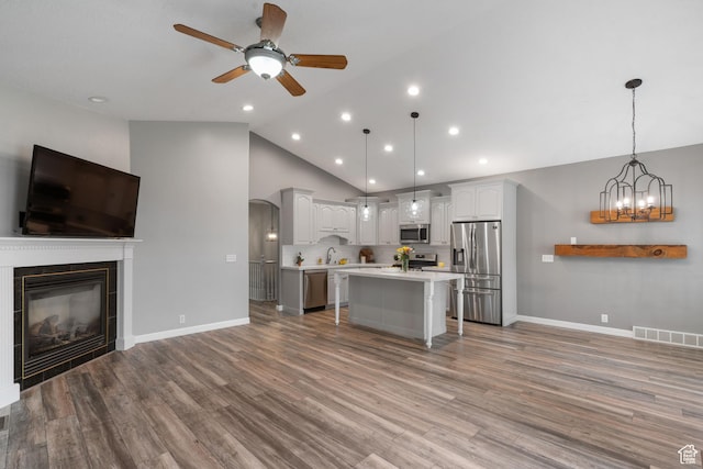 311 E Edgemont Dr S, North Salt Lake, UT 84054 - kitchen featuring open floor plan, appliances with stainless steel finishes, a ceiling fan, light countertops, and recessed lighting