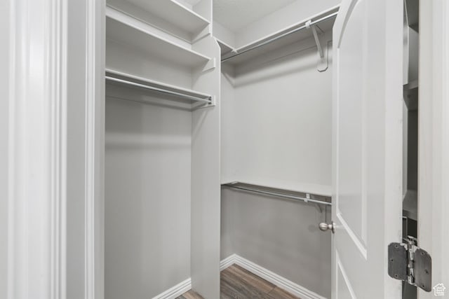 311 E Edgemont Dr S, North Salt Lake, UT 84054 - walk in closet featuring wood finished floors