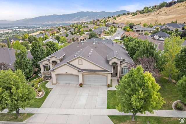 311 E Edgemont Dr S, North Salt Lake, UT 84054 - aerial view of residential area with a mountain backdrop