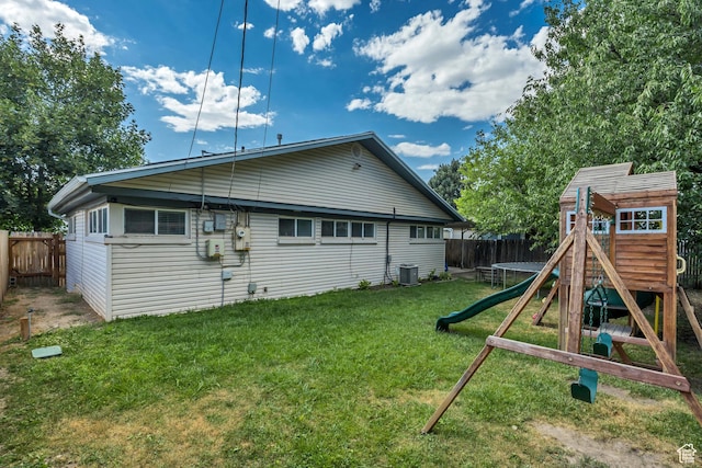 1517 S 700 W, Woods Cross, UT 84087 - back of property with a playground, a fenced backyard, and a trampoline