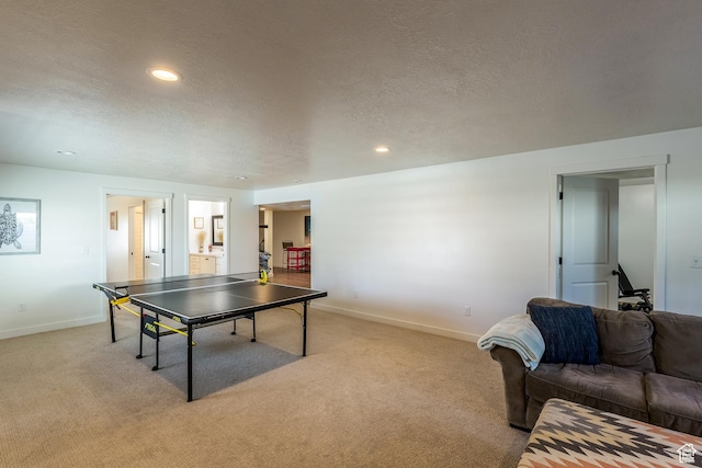 69 W 2200 S, Kaysville, UT 84037 - recreation room with light colored carpet, a textured ceiling, and recessed lighting