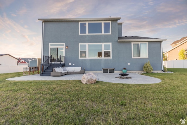 69 W 2200 S, Kaysville, UT 84037 - back of house featuring a patio, an outdoor living space, and stucco siding