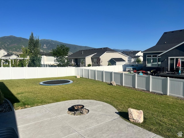 69 W 2200 S, Kaysville, UT 84037 - view of yard with an outdoor fire pit, a mountain view, a patio, and a residential view