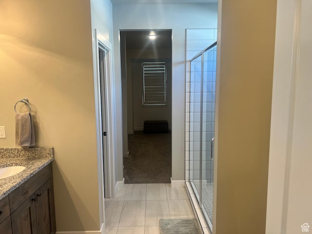 69 W 2200 S, Kaysville, UT 84037 - bathroom featuring a stall shower, vanity, and tile patterned flooring
