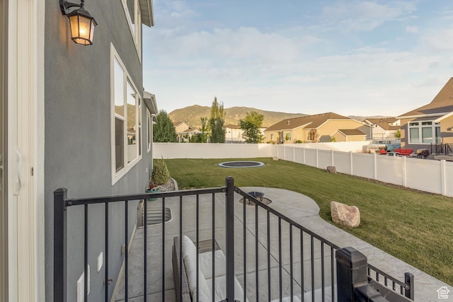 69 W 2200 S, Kaysville, UT 84037 - fenced backyard featuring a patio, a residential view, and a mountain view