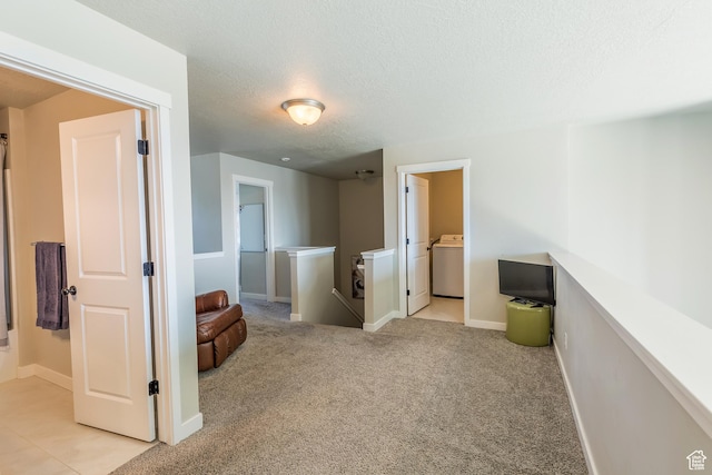 69 W 2200 S, Kaysville, UT 84037 - spare room featuring a textured ceiling, washer / dryer, and light colored carpet