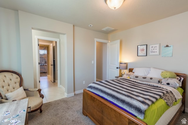 69 W 2200 S, Kaysville, UT 84037 - bedroom featuring light carpet and light tile patterned floors