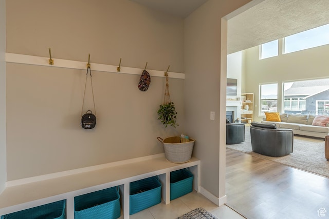 69 W 2200 S, Kaysville, UT 84037 - mudroom featuring a glass covered fireplace