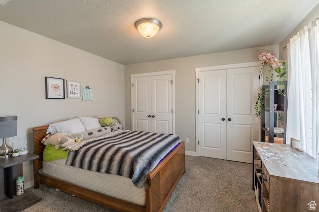 69 W 2200 S, Kaysville, UT 84037 - carpeted bedroom with baseboards and multiple closets
