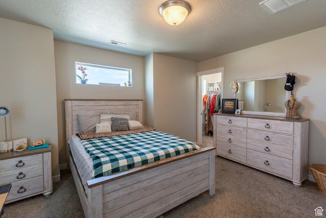 69 W 2200 S, Kaysville, UT 84037 - bedroom with carpet flooring, a spacious closet, and a textured ceiling