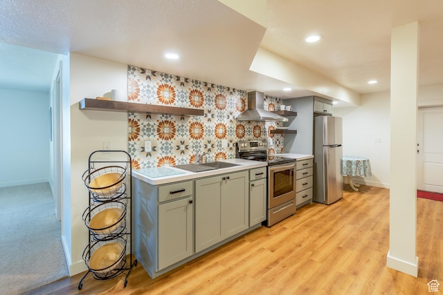 69 W 2200 S, Kaysville, UT 84037 - kitchen with open shelves, appliances with stainless steel finishes, wall chimney exhaust hood, gray cabinetry, and recessed lighting