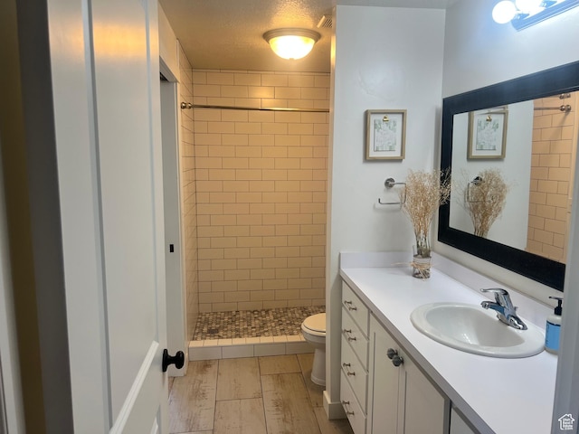 69 W 2200 S, Kaysville, UT 84037 - bathroom featuring a shower stall, vanity, and wood finished floors