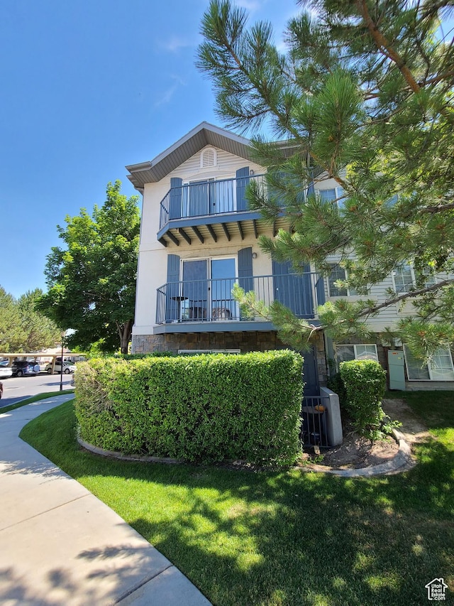 1132 W 1390 S, Orem, UT 84058 - view of front of property featuring a balcony and a front yard