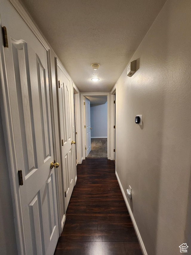 1132 W 1390 S, Orem, UT 84058 - corridor with dark wood-type flooring and a textured ceiling