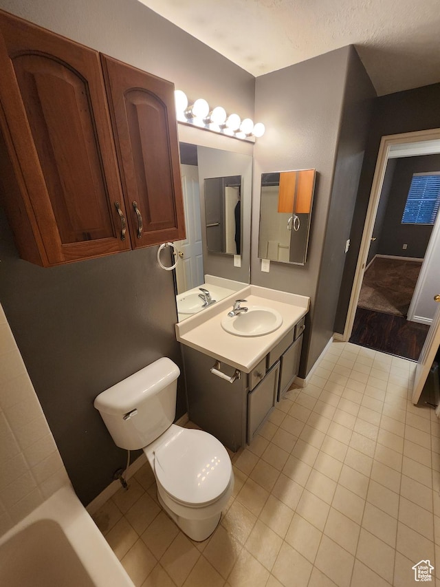 1132 W 1390 S, Orem, UT 84058 - bathroom featuring a bathtub, vanity, and tile patterned flooring