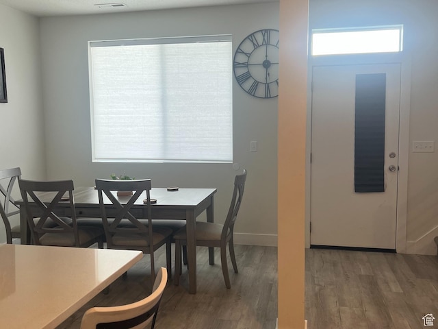 3589 S Xenon Dr W, West Valley City, UT 84119 - dining area with healthy amount of natural light and wood finished floors