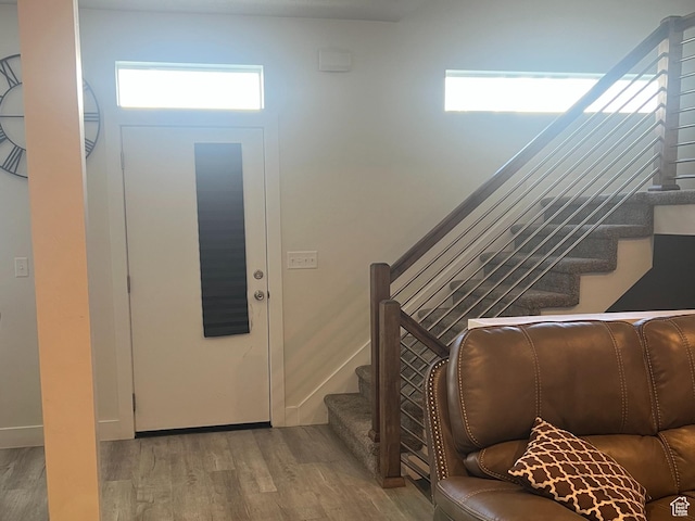 3589 S Xenon Dr W, West Valley City, UT 84119 - entrance foyer with stairs and wood finished floors