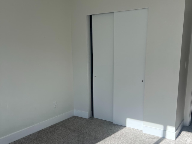 3589 S Xenon Dr W, West Valley City, UT 84119 - unfurnished bedroom featuring carpet floors and a closet