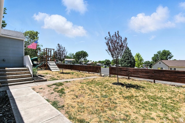 291 S 700 E, Spanish Fork, UT 84660 - fenced backyard featuring a playground