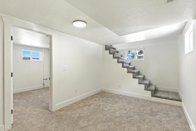 291 S 700 E, Spanish Fork, UT 84660 - basement featuring light carpet, stairs, and a textured ceiling