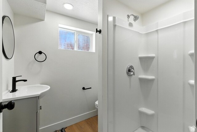 291 S 700 E, Spanish Fork, UT 84660 - full bath featuring vanity, wood finished floors, and a shower