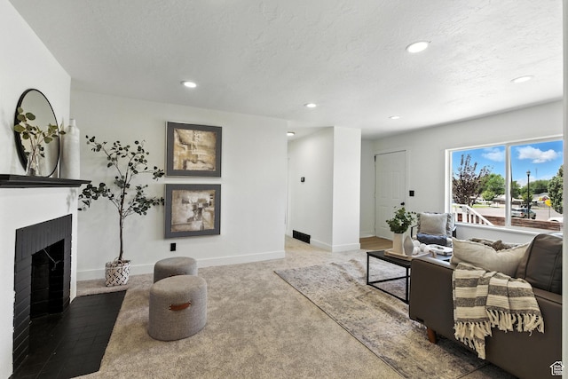 291 S 700 E, Spanish Fork, UT 84660 - carpeted living room with a fireplace, recessed lighting, and a textured ceiling