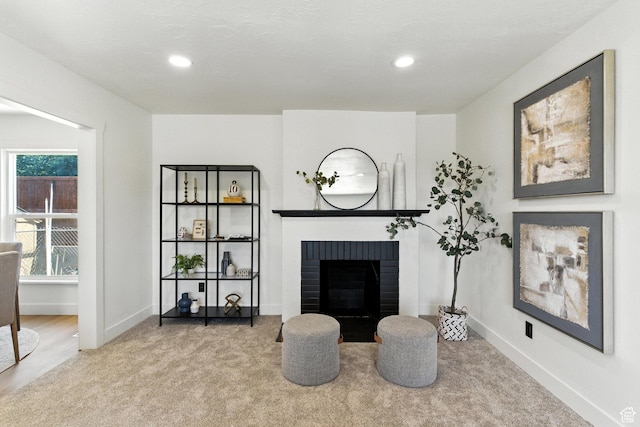 291 S 700 E, Spanish Fork, UT 84660 - carpeted living area featuring a fireplace and recessed lighting