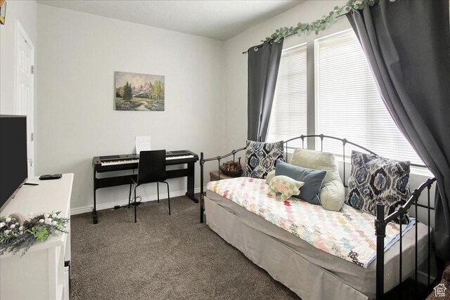 3241 Grant Ave, Ogden, UT 84401 - carpeted bedroom with baseboards