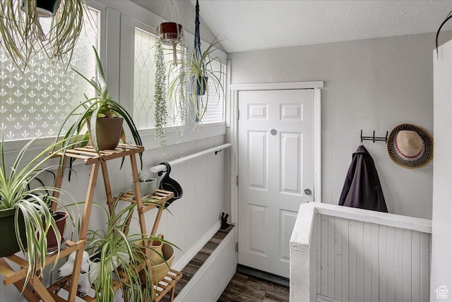 3241 Grant Ave, Ogden, UT 84401 - doorway featuring wood finished floors and vaulted ceiling