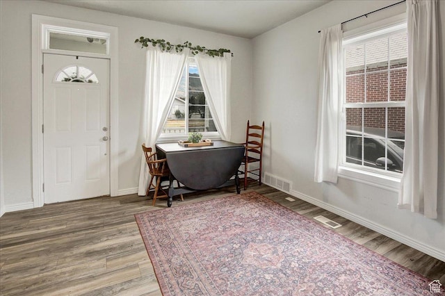 3241 Grant Ave, Ogden, UT 84401 - foyer featuring wood finished floors and plenty of natural light
