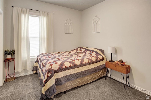 3241 Grant Ave, Ogden, UT 84401 - carpeted bedroom with baseboards