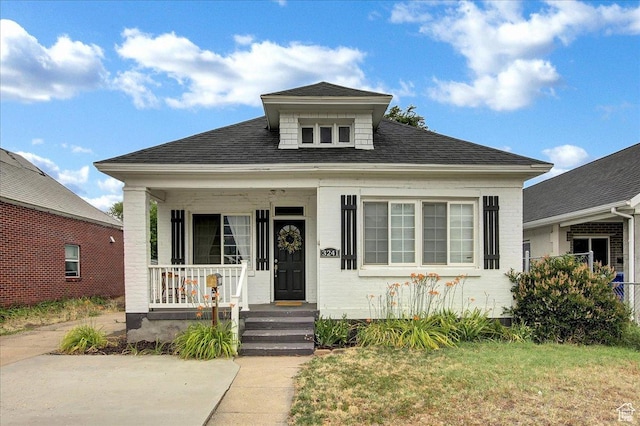 3241 Grant Ave, Ogden, UT 84401 - bungalow featuring covered porch and roof with shingles