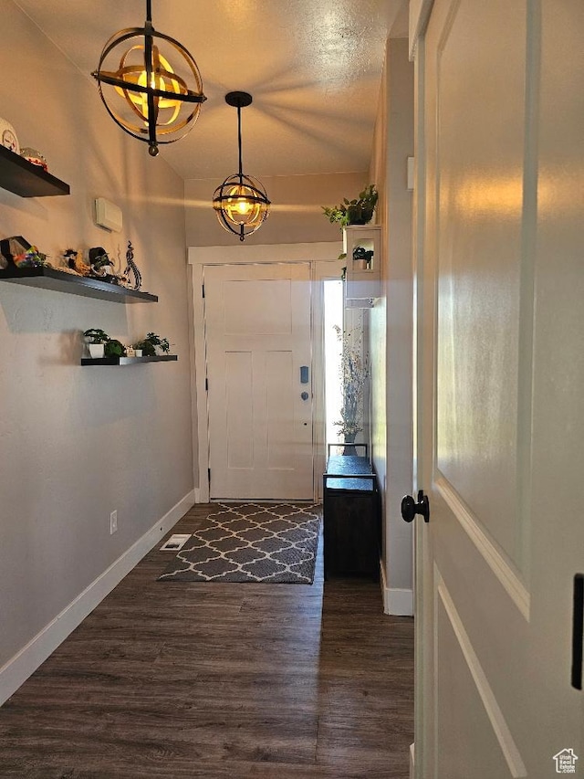 826 S 300 W, Vernal, UT 84078 - foyer entrance featuring dark wood-style flooring and baseboards