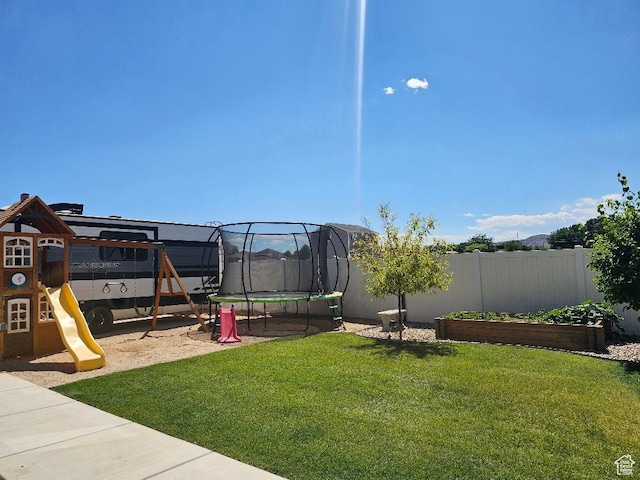 826 S 300 W, Vernal, UT 84078 - view of yard featuring a trampoline, a garden, and a playground