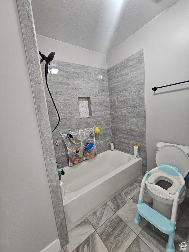 826 S 300 W, Vernal, UT 84078 - bathroom with marble finish flooring, bathing tub / shower combination, and a textured ceiling