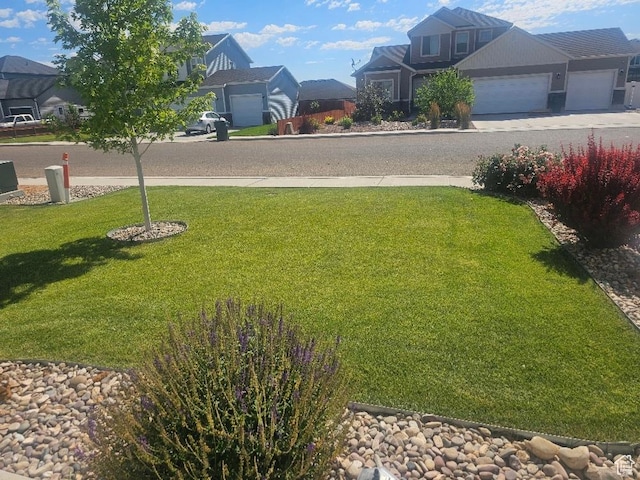 826 S 300 W, Vernal, UT 84078 - view of grassy yard with a garage and driveway