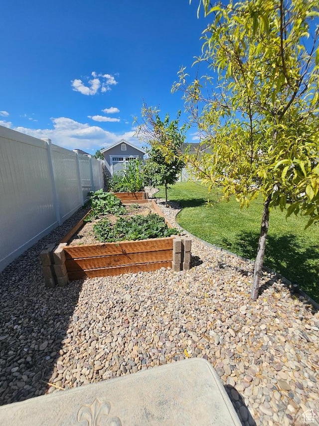 826 S 300 W, Vernal, UT 84078 - fenced backyard featuring a vegetable garden