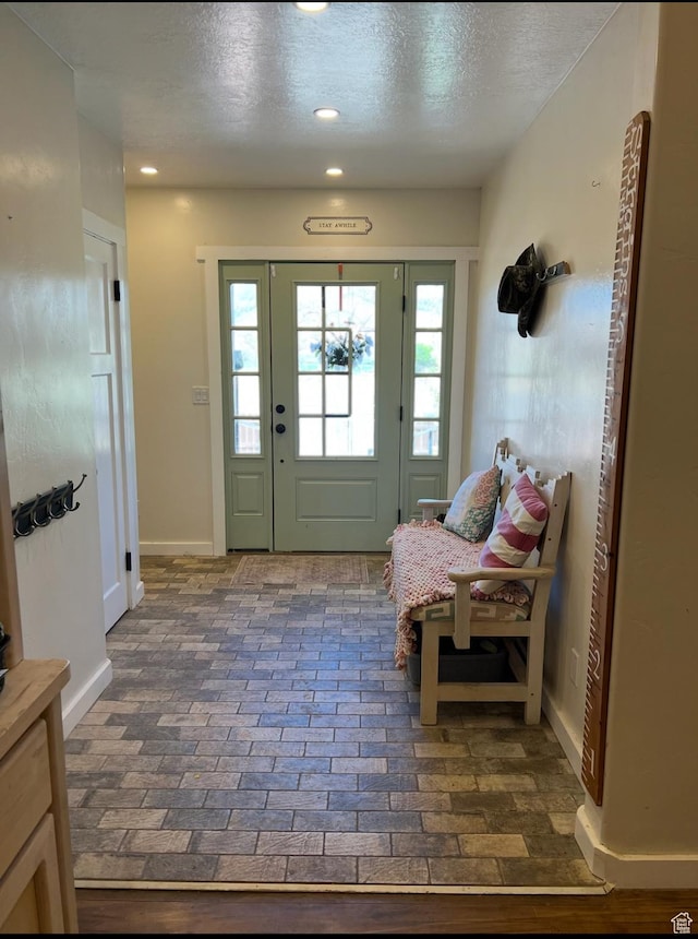 1375 N State St, Sigurd, UT 84657 - foyer entrance featuring a textured ceiling, brick flooring, and recessed lighting