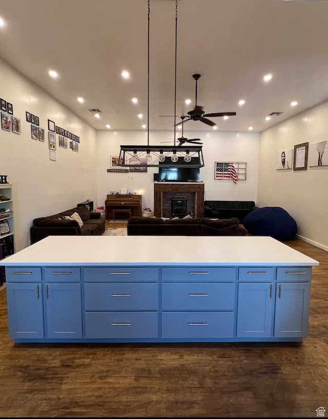 1375 N State St, Sigurd, UT 84657 - kitchen with open floor plan, blue cabinets, dark wood-style floors, and recessed lighting