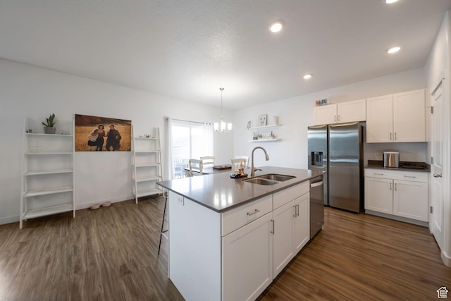 14837 S Messi St, Herriman, UT 84096 - kitchen with appliances with stainless steel finishes, dark wood-style flooring, white cabinets, and recessed lighting