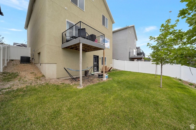14837 S Messi St, Herriman, UT 84096 - rear view of property with a balcony, a fenced backyard, and stucco siding