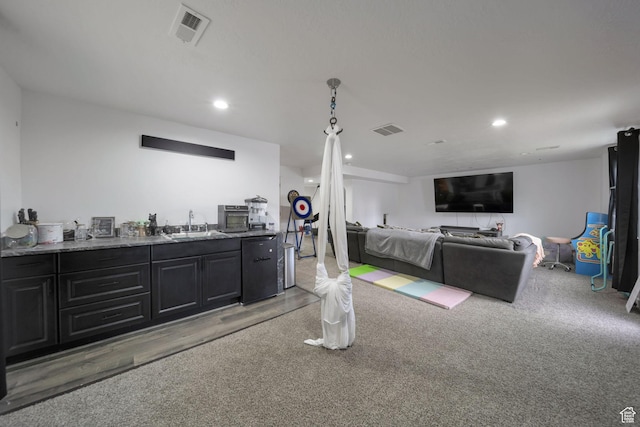 14837 S Messi St, Herriman, UT 84096 - living room with recessed lighting, light wood finished floors, and bar area
