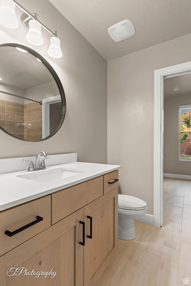 2762 E Hazel Dr, St George, UT 84790 - bathroom featuring vanity, wood finished floors, and a shower