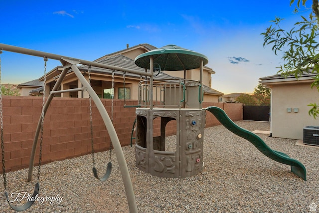 2762 E Hazel Dr, St George, UT 84790 - playground at dusk featuring a playground
