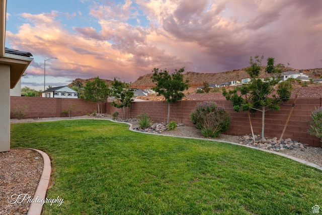 2762 E Hazel Dr, St George, UT 84790 - yard at dusk with a fenced backyard