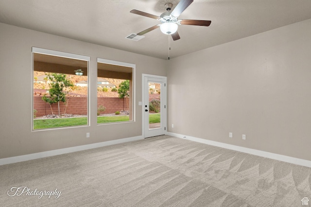2762 E Hazel Dr, St George, UT 84790 - spare room with light carpet and ceiling fan